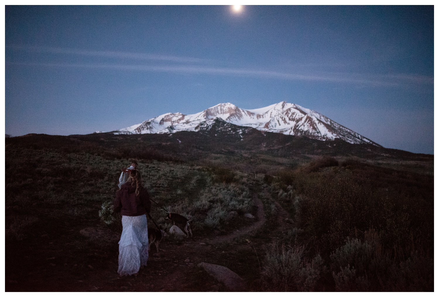 A bride and groom at celebrating their wedding day with a Carbondale, Colorado elopement near Aspen and Glenwood Springs at Mt. Sopris.