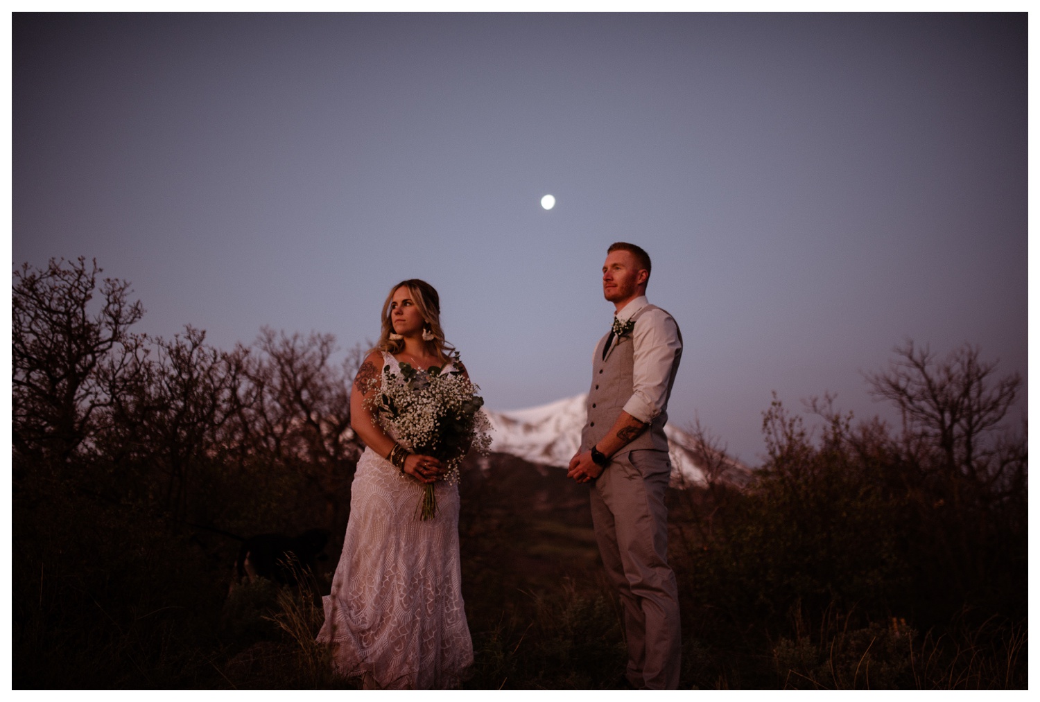 A bride and groom at celebrating their wedding day with a Carbondale, Colorado elopement near Aspen and Glenwood Springs at Mt. Sopris.