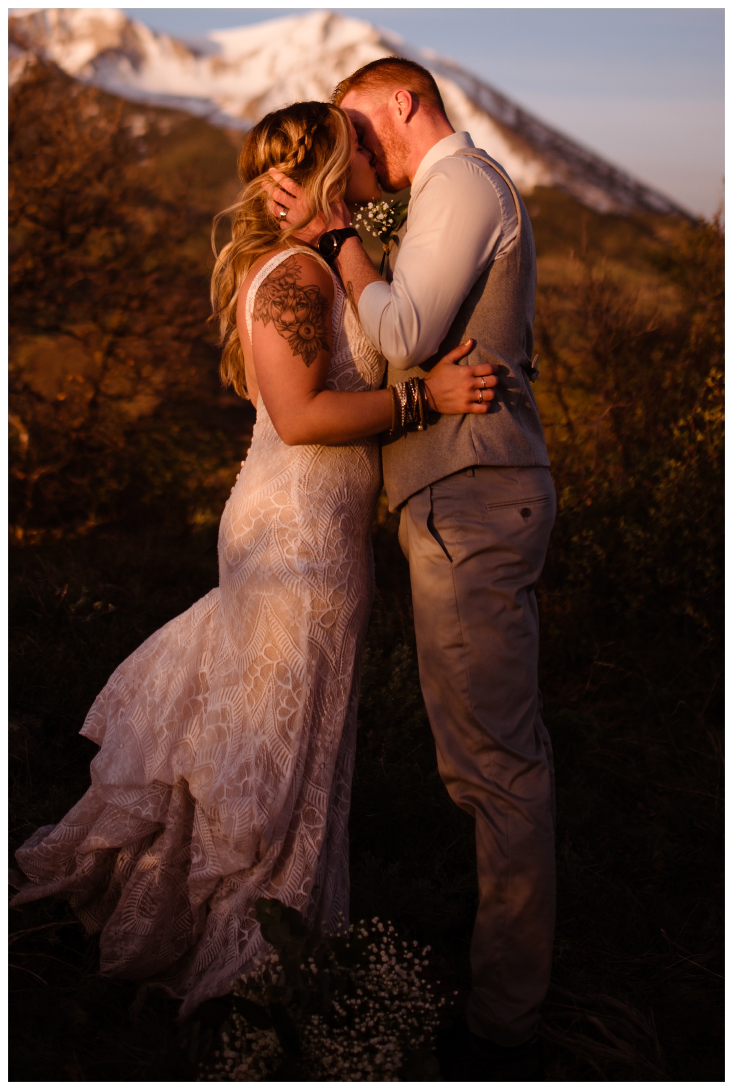 A bride and groom at celebrating their wedding day with a Carbondale, Colorado elopement near Aspen and Glenwood Springs at Mt. Sopris.