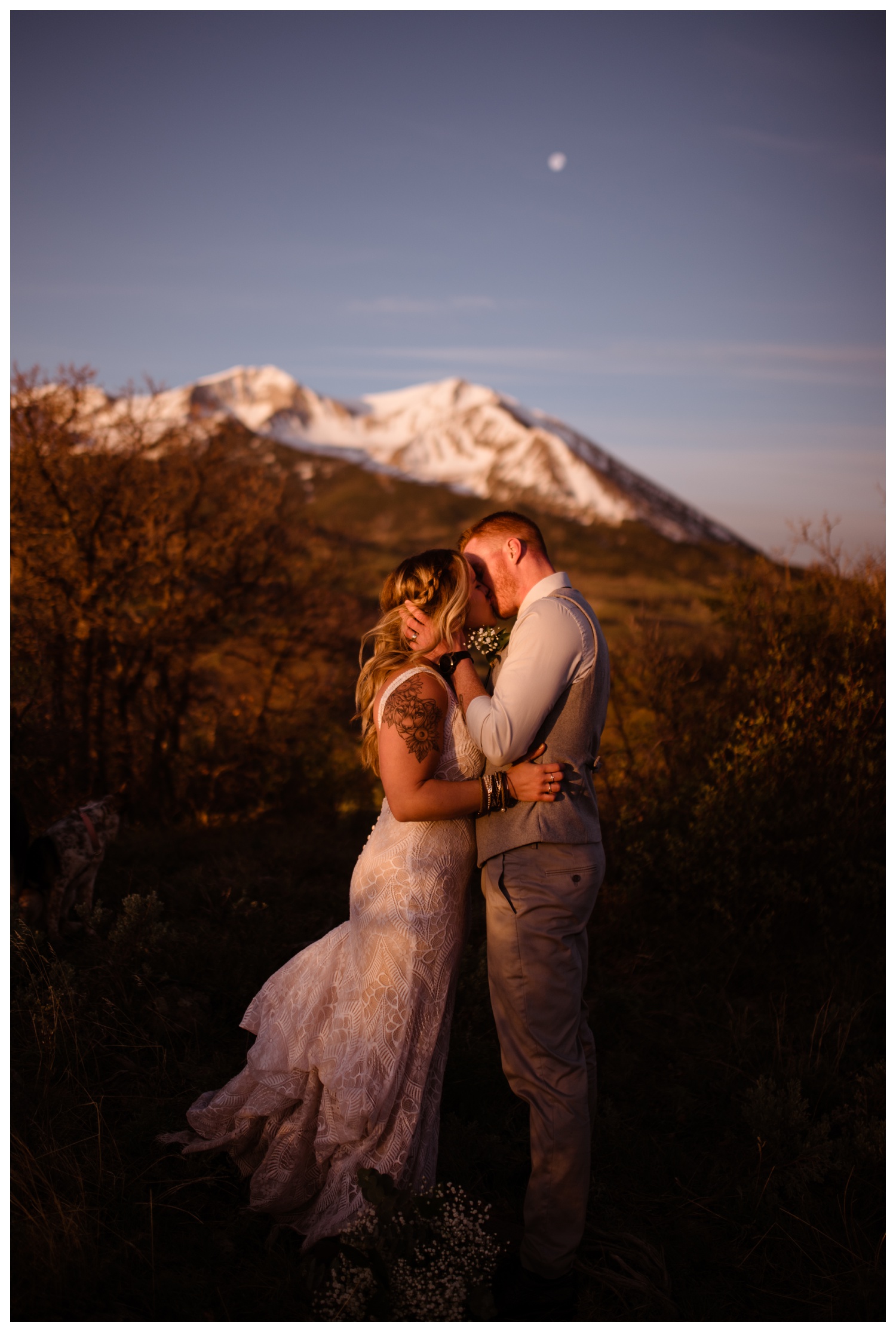 A bride and groom at celebrating their wedding day with a Carbondale, Colorado elopement near Aspen and Glenwood Springs at Mt. Sopris.