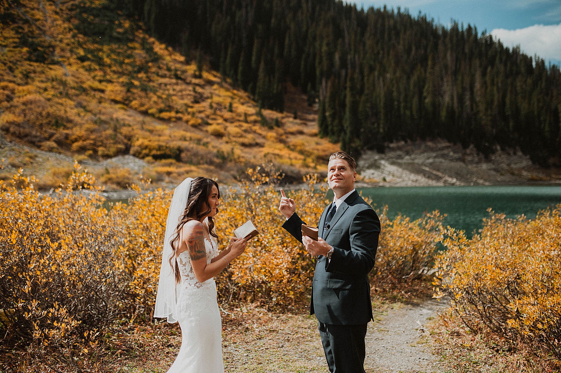 bride and groom first look at emerald lake in crested butte on their wedding day