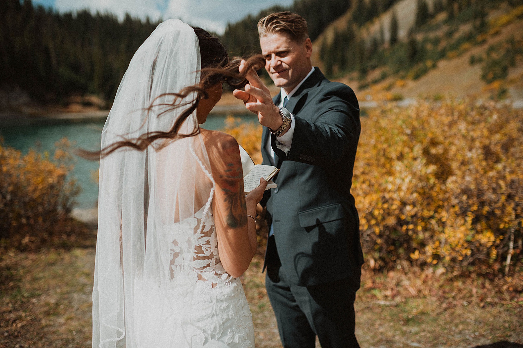 bride and groom first look at emerald lake in crested butte on their wedding day