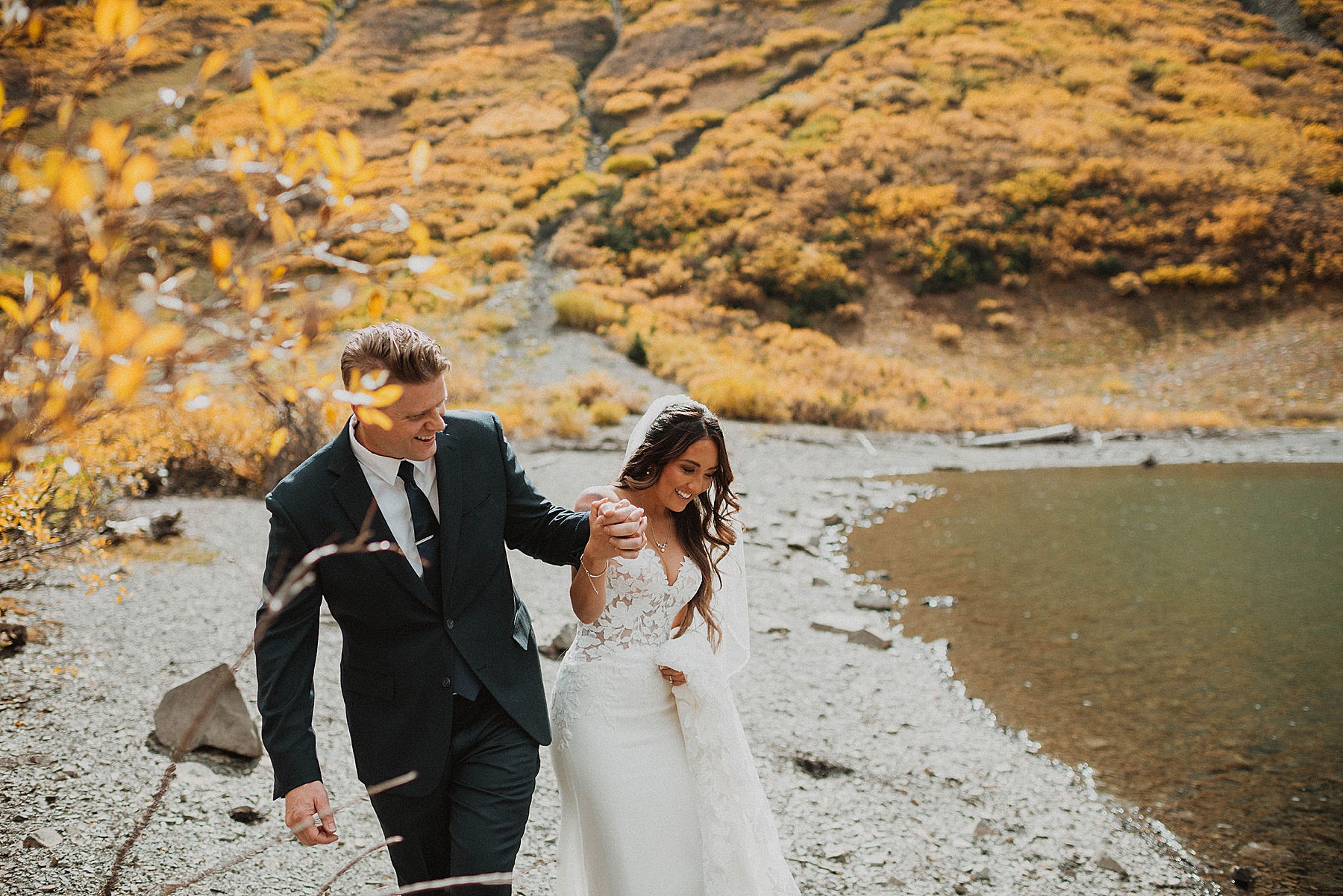 bride and groom first look at emerald lake in crested butte on their wedding day