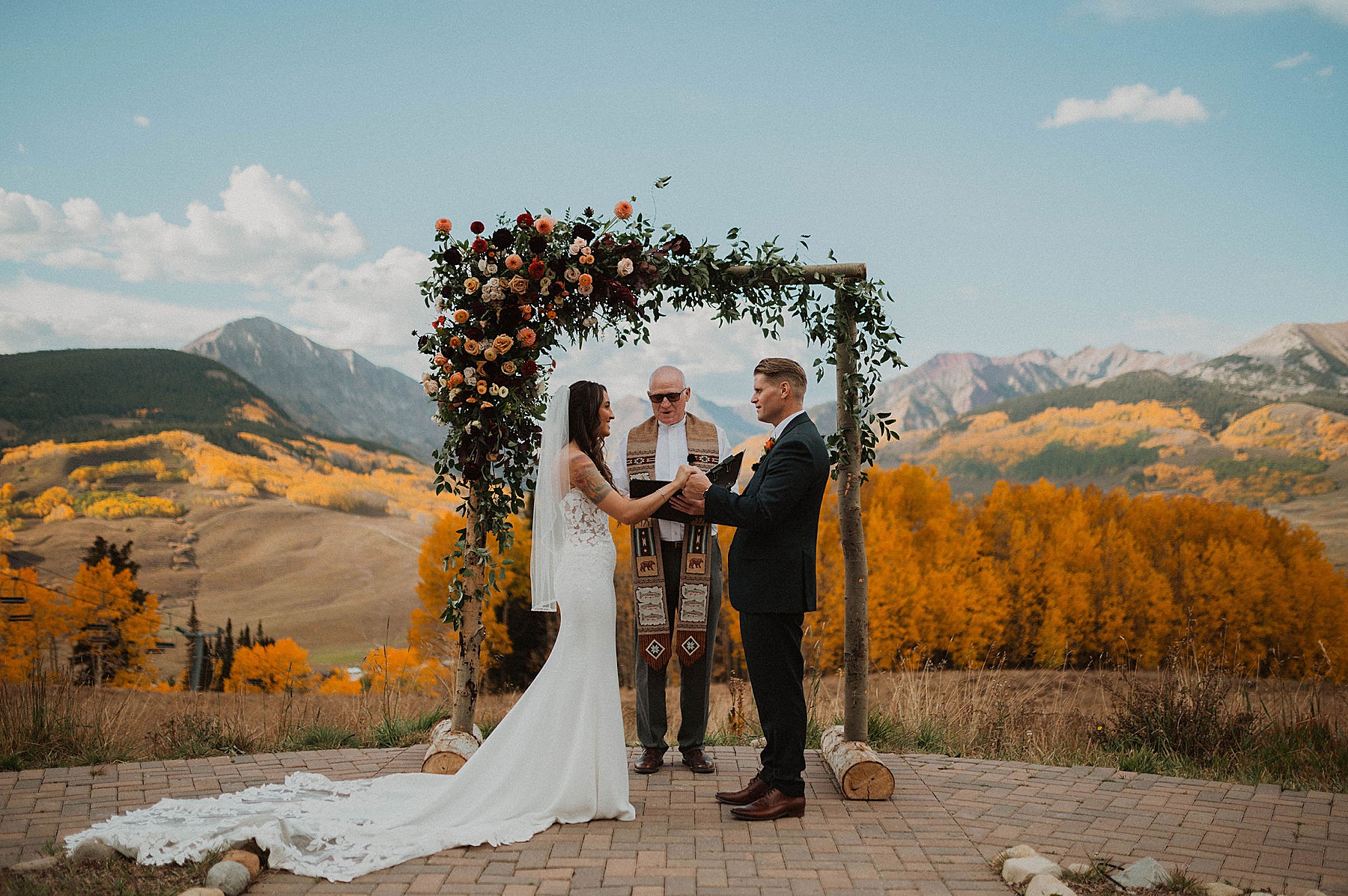 wedding on ten peaks at crested butte resort in crested butte for their fall wedding in the mountains