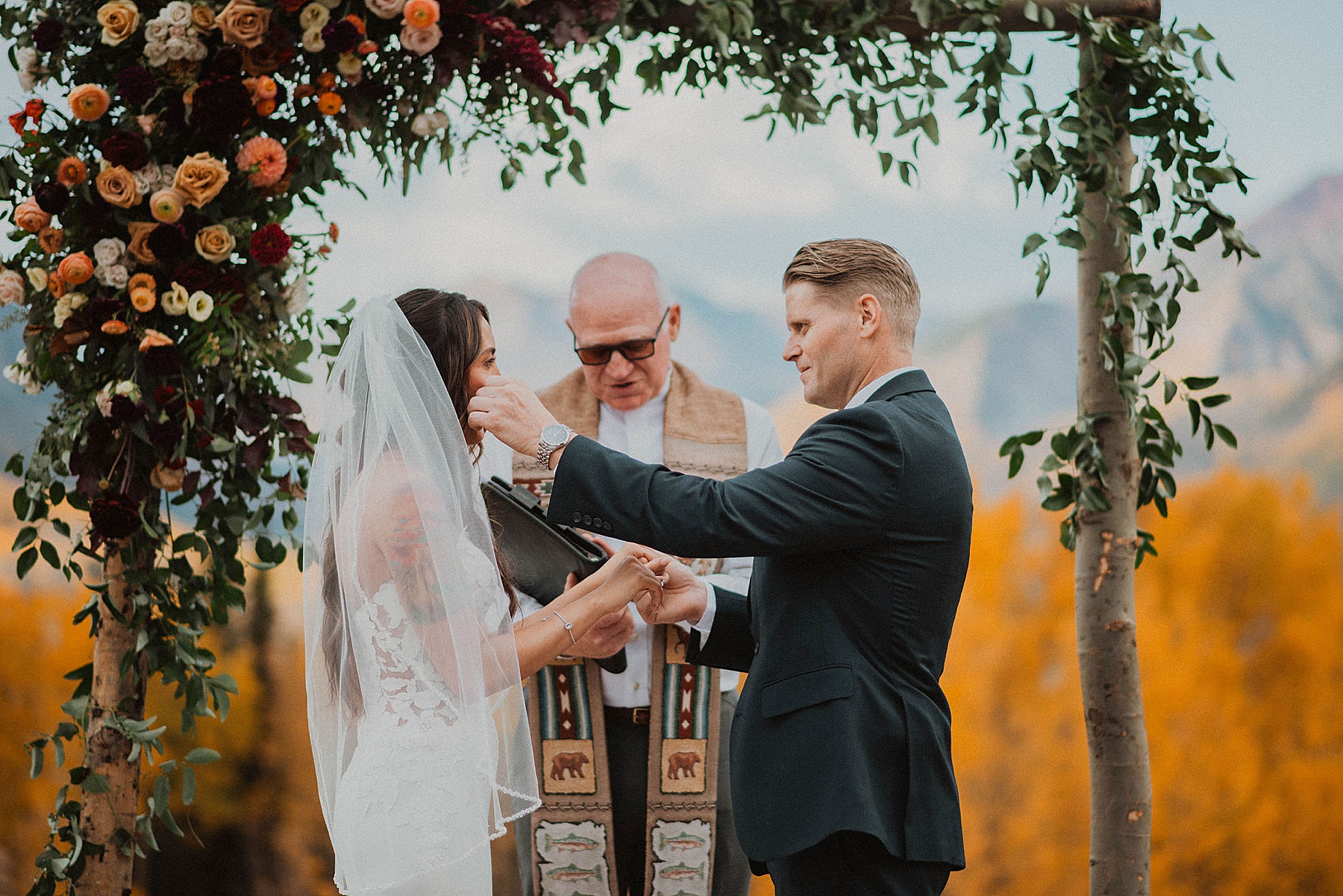 wedding on ten peaks at crested butte resort in crested butte for their fall wedding in the mountains