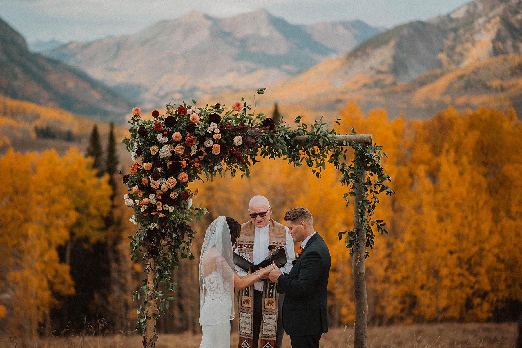 wedding on ten peaks at crested butte resort in crested butte for their fall wedding in the mountains