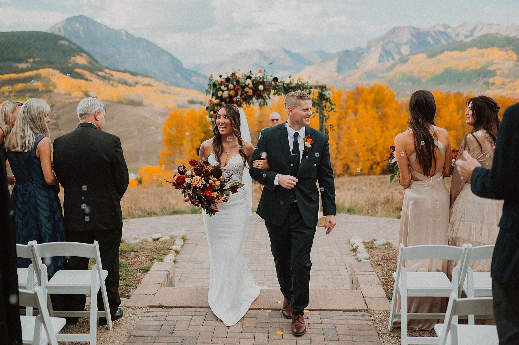 wedding on ten peaks at crested butte resort in crested butte for their fall wedding in the mountains