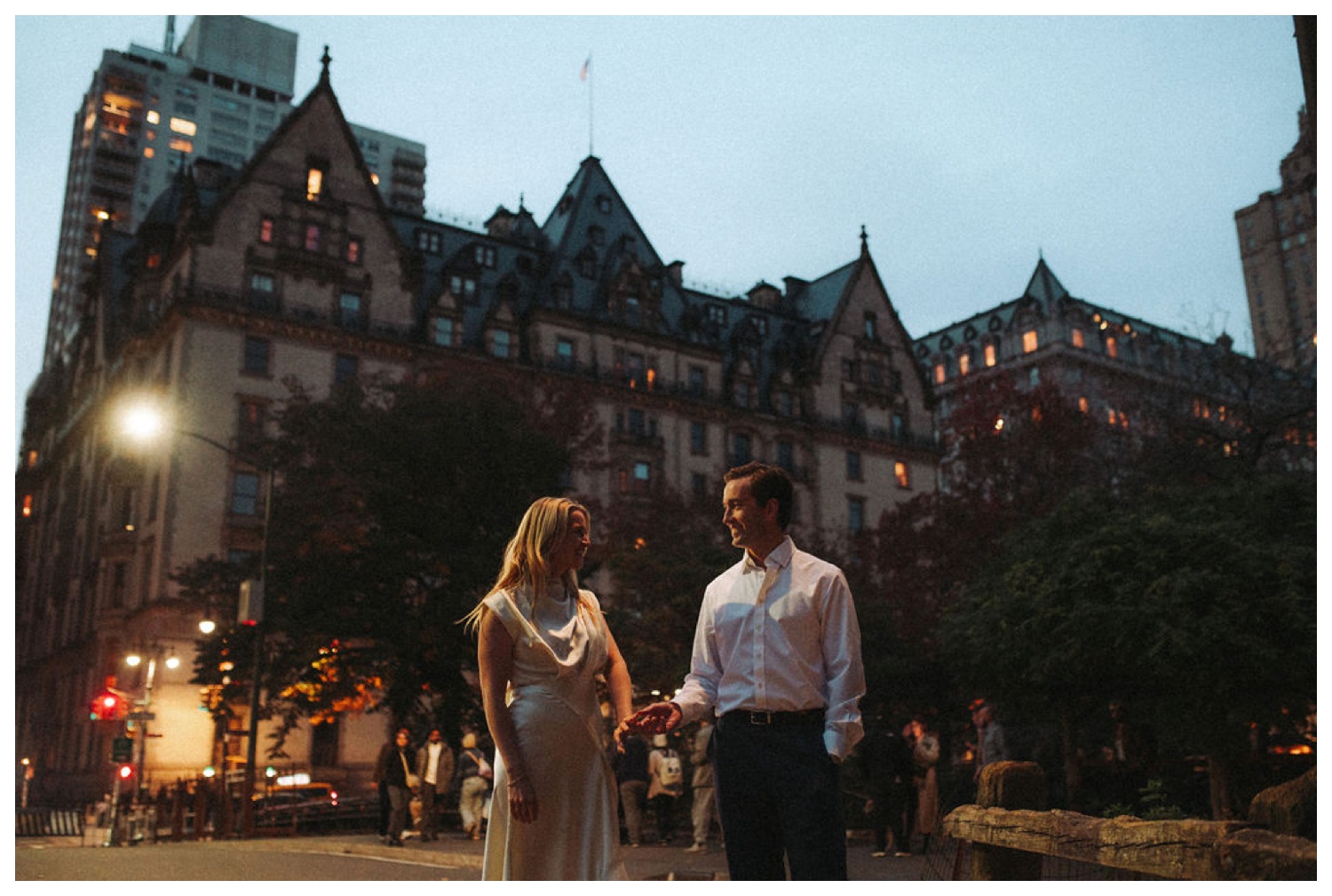 bride and groom at bethesda terrace in central park for an engagement session. NYC wedding photographer.