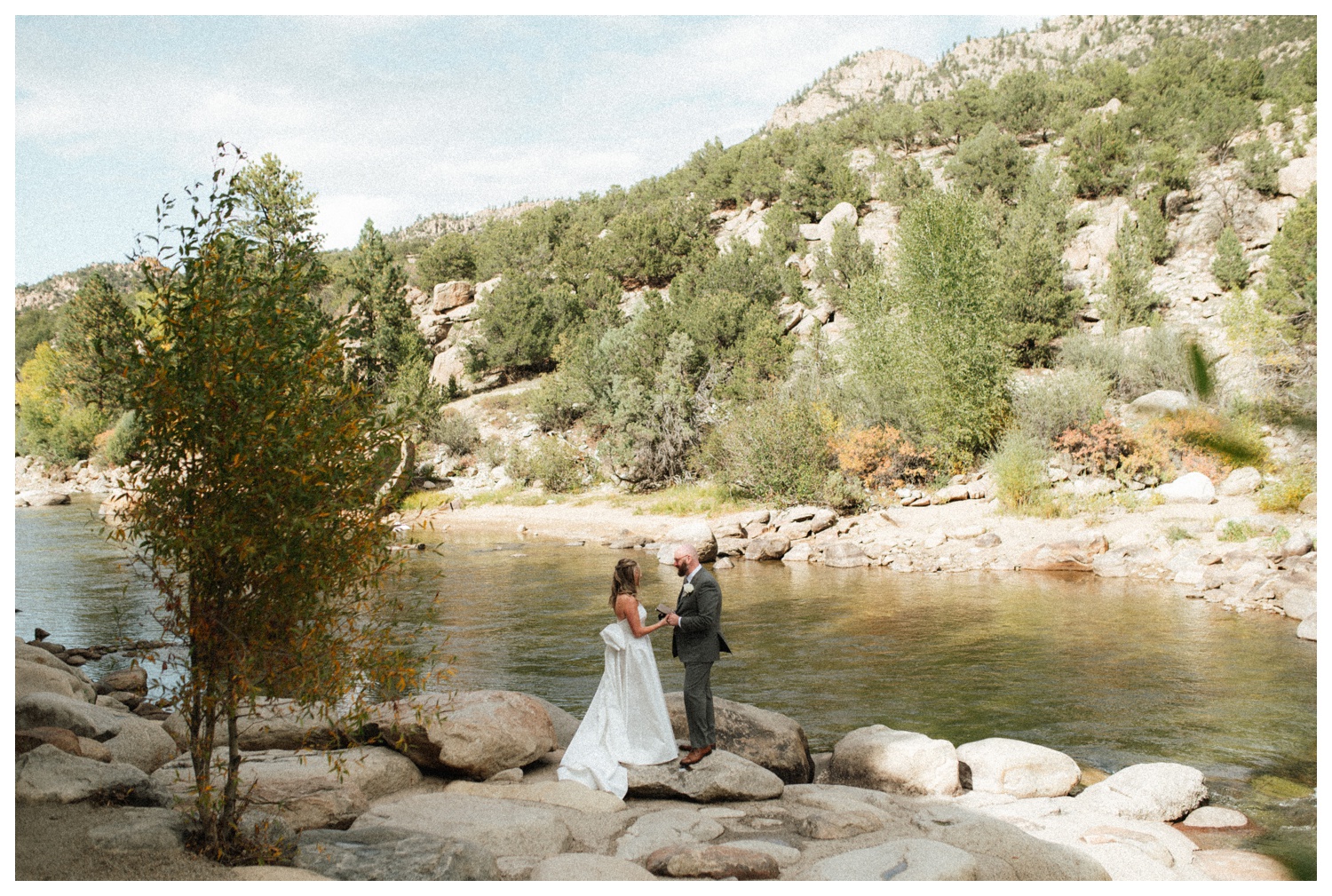 Bride and groom in Surf Hotel down by the river reading their vows, Buena Vista on their wedding day. Colorado wedding photographer. Parr Photo Co. Luxury wedding. Chateau wedding. 