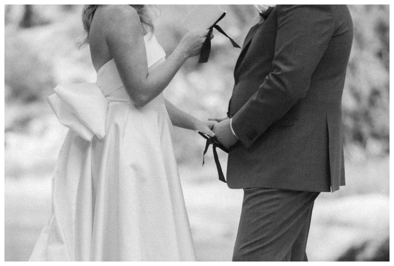 Bride and groom in Surf Hotel down by the river reading their vows, Buena Vista on their wedding day. Colorado wedding photographer. Parr Photo Co. Luxury wedding. Chateau wedding. 