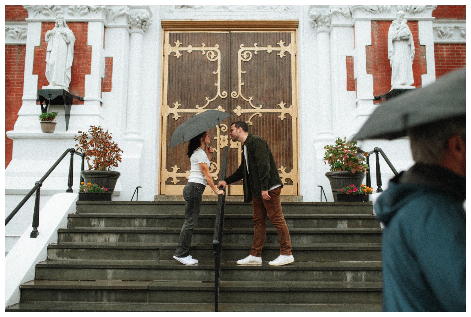 Engaged couple in front of their church in Greenpoint Brooklyn.