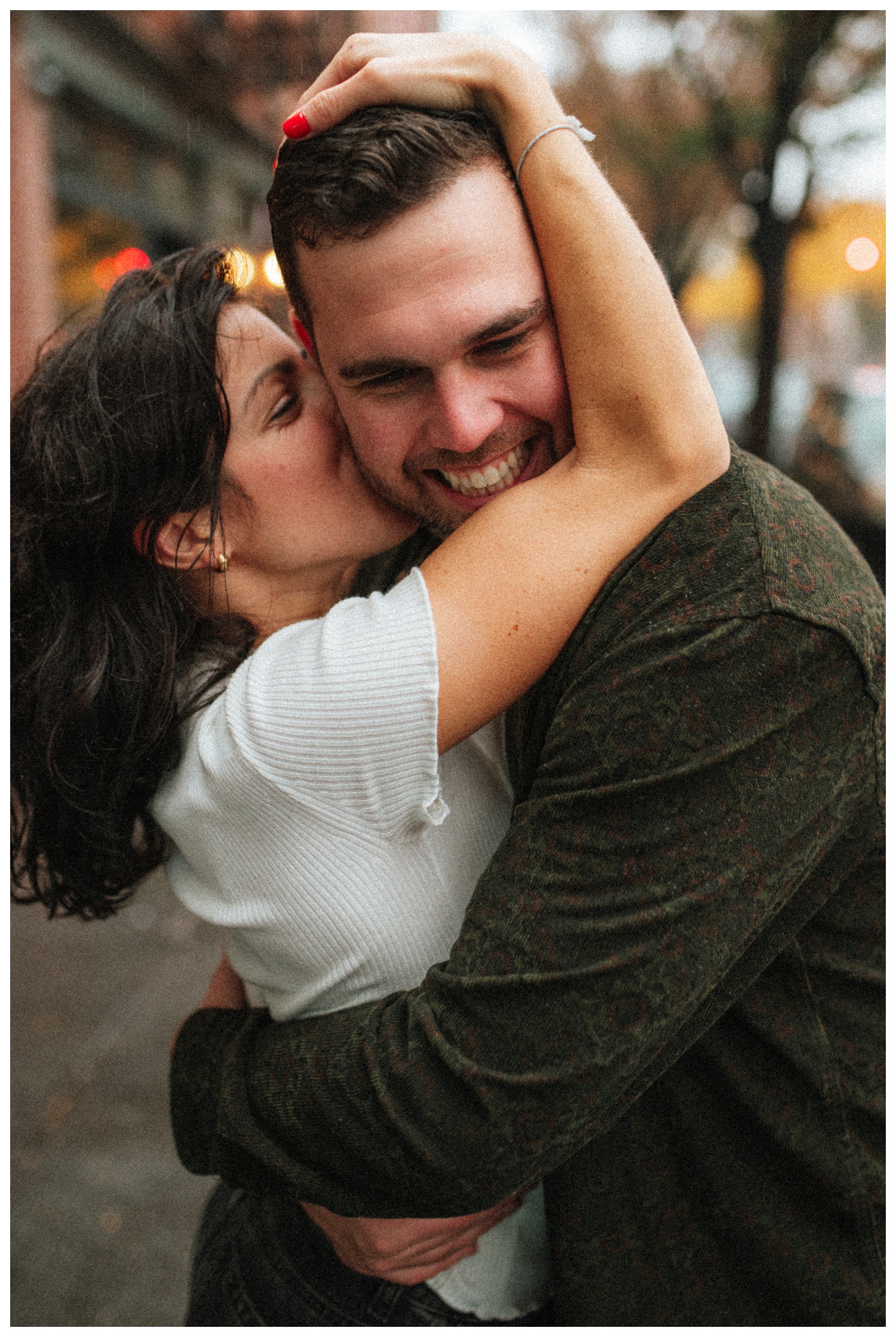 Engaged couple on the streets of Greenpoint Brooklyn on a rainy day. Brooklyn Wedding Photographer. Parr Photo Co