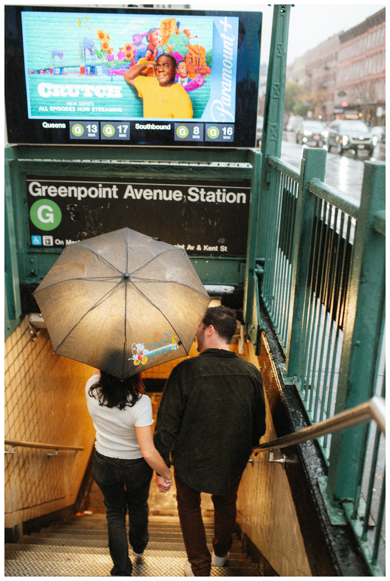 Engaged couple walking down the Greenpoint subway station. Brooklyn Wedding Photographer