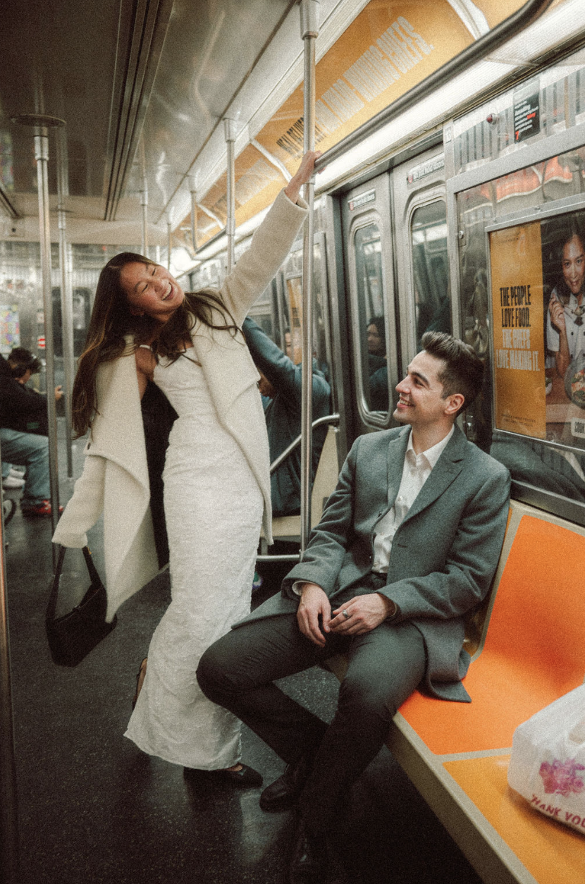 Bride and groom on the subway in Manhattan from their engagement session in Chinatown NYC. Parr Photo Co. Brooklyn wedding photographer. Manhattan wedding photographer. 