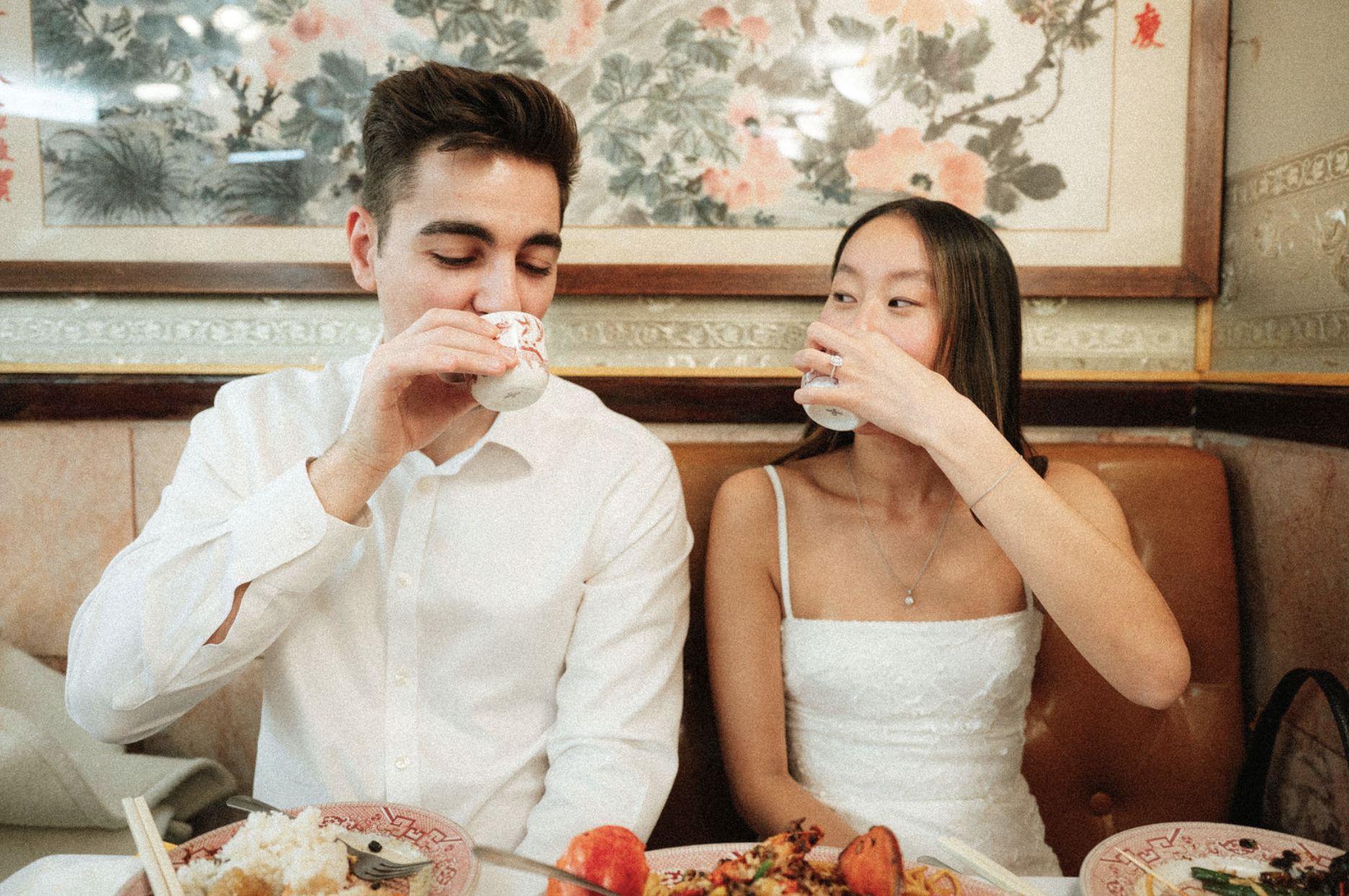 A bride and groom at their family restaurant, Hop Lee on Mott St for their engagement session in Chinatown NYC. Manhattan wedding photographer. Brooklyn wedding photographer. Parr Photo Co