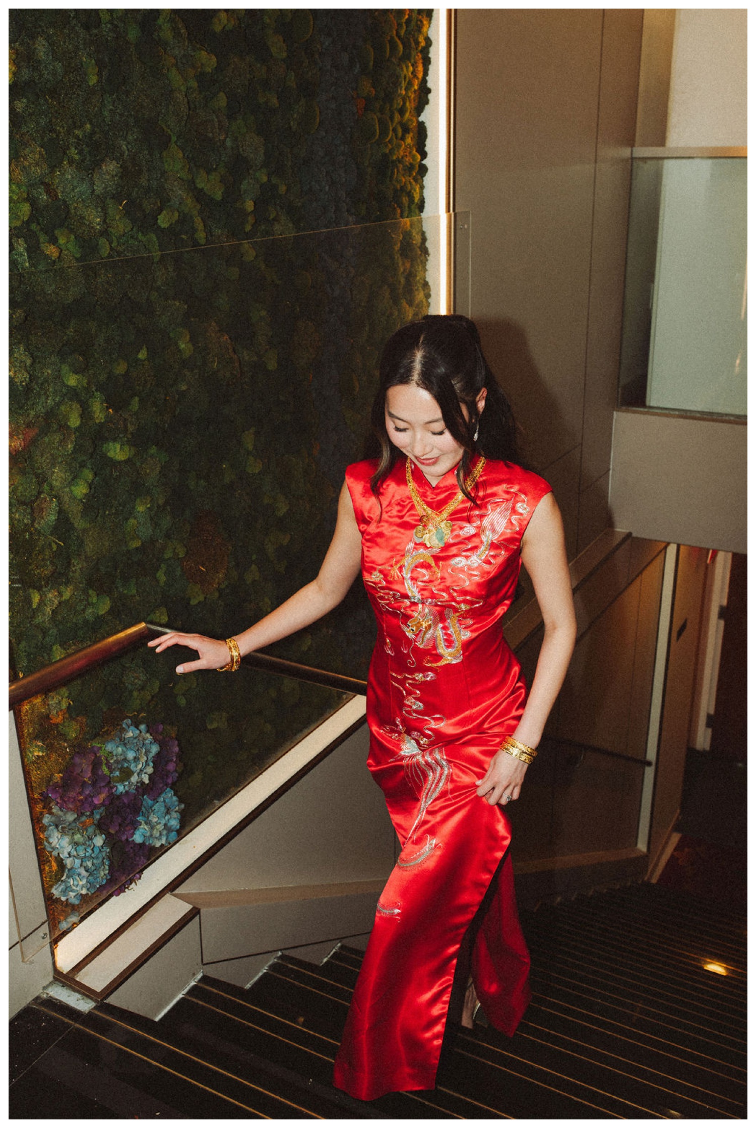 A couple taking portraits on the streets of chinatown in NYC for their tea ceremony at House Of Joy. NYC Wedding Photographer. Parr Photo Co