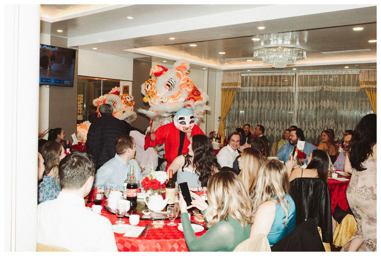 Lion dancers performing at House Of Joy in NYC for a tea ceremony